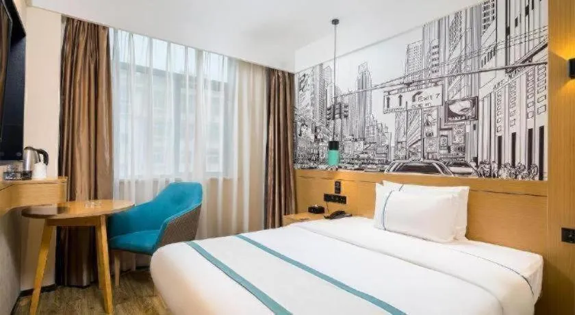 Bed in City Comfort Inn Taizhou Wanda Plaza