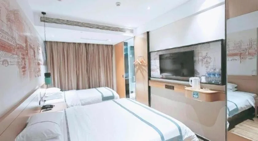 Bed in City Comfort Inn Taizhou Wanda Plaza