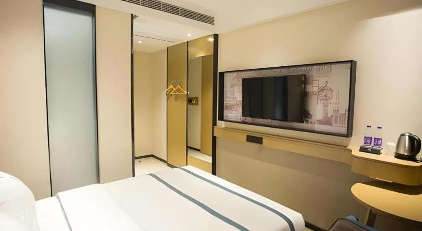 Bed in City Comfort Inn Taizhou Wanda Plaza