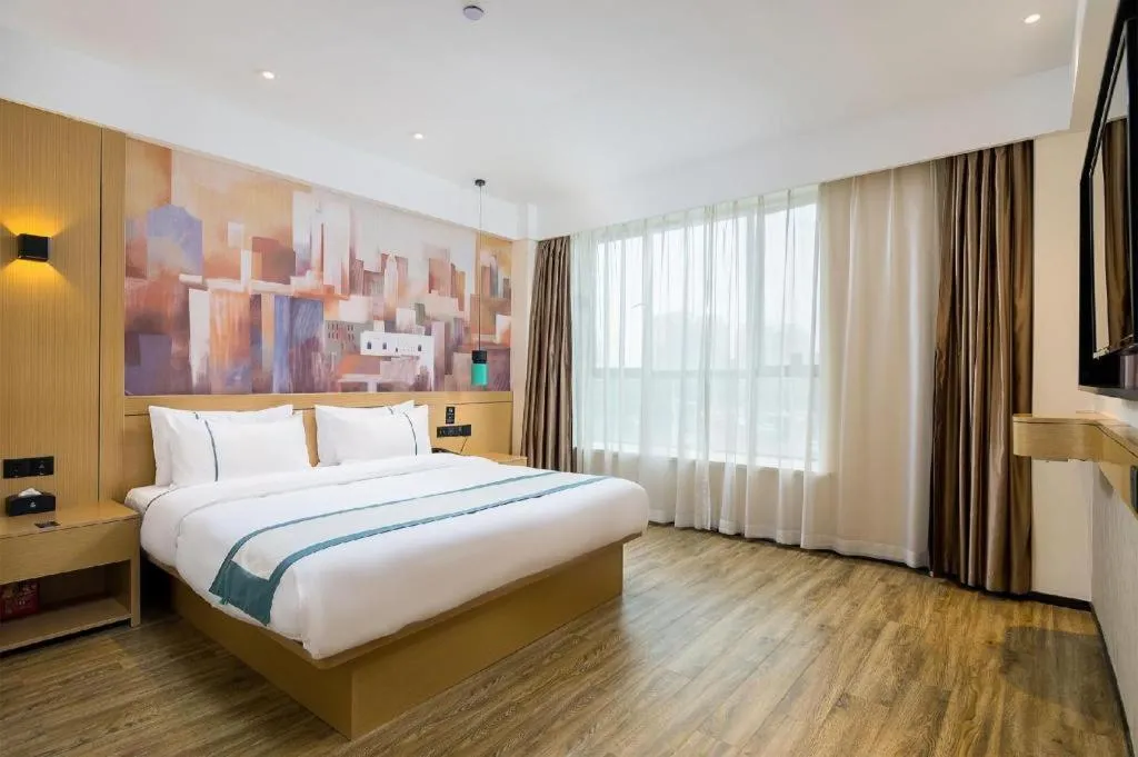 Bed in City Comfort Inn Taizhou Wanda Plaza
