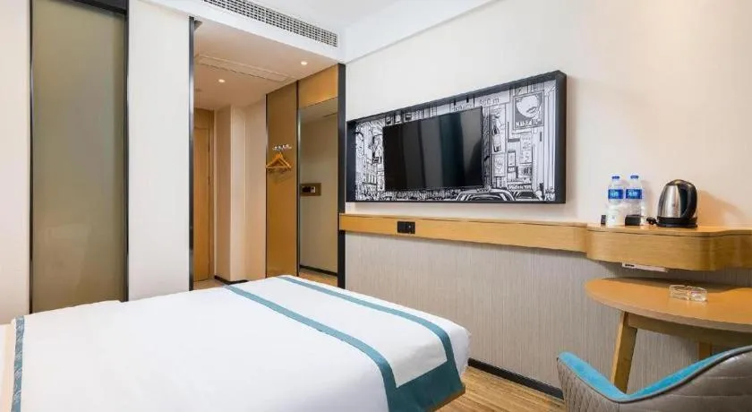 Bed in City Comfort Inn Taizhou Wanda Plaza