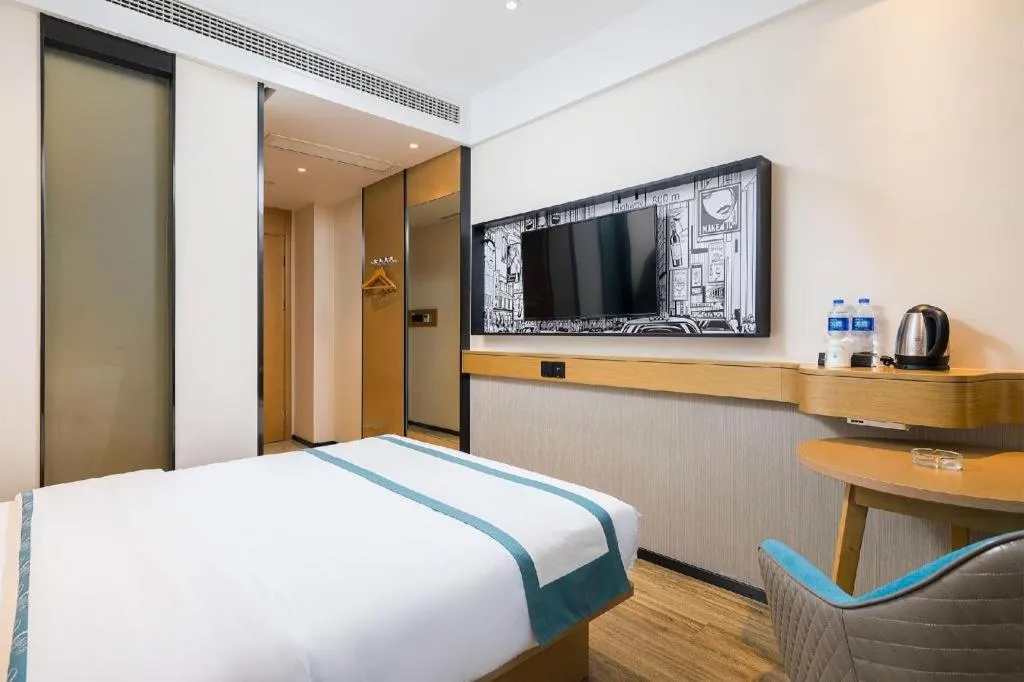 Bed in City Comfort Inn Taizhou Wanda Plaza