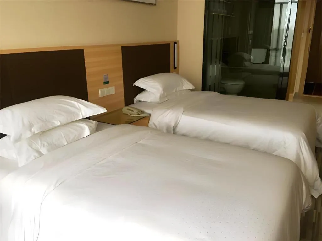Bed in City Comfort Inn Hefei Binhu Wanghu Building Exhibition Center