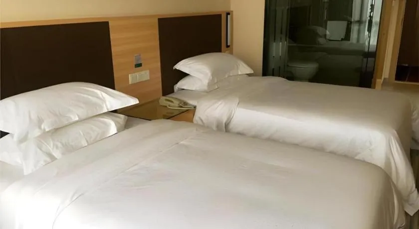 Bed in City Comfort Inn Hefei Binhu Wanghu Building Exhibition Center