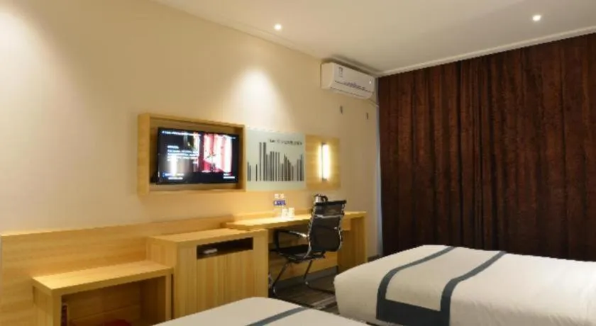 Bed in City Comfort Inn Huanggang Qichun Exhibition Center