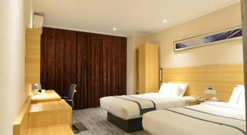 Bed in City Comfort Inn Huanggang Qichun Exhibition Center Bed in City Comfort Inn Huanggang Qichun Exhibition Center