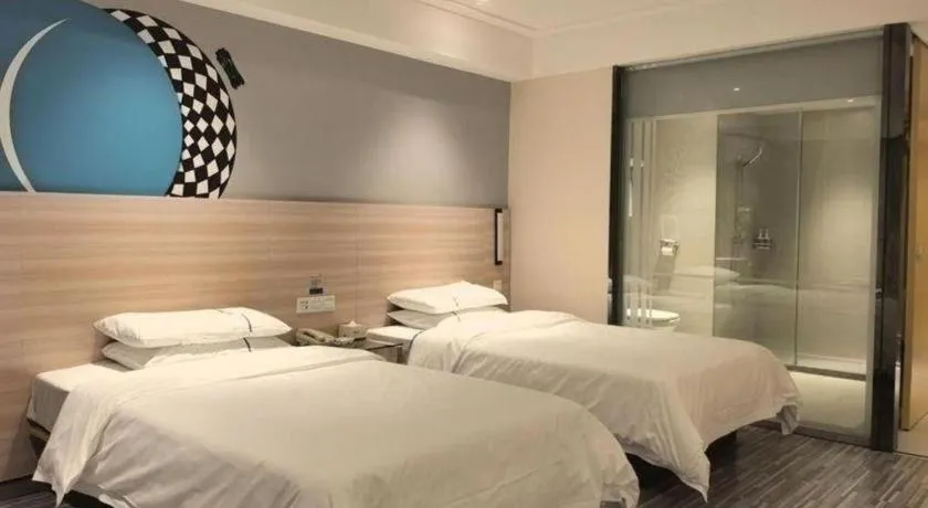 Bed in City Comfort Inn Huanggang Qichun Exhibition Center