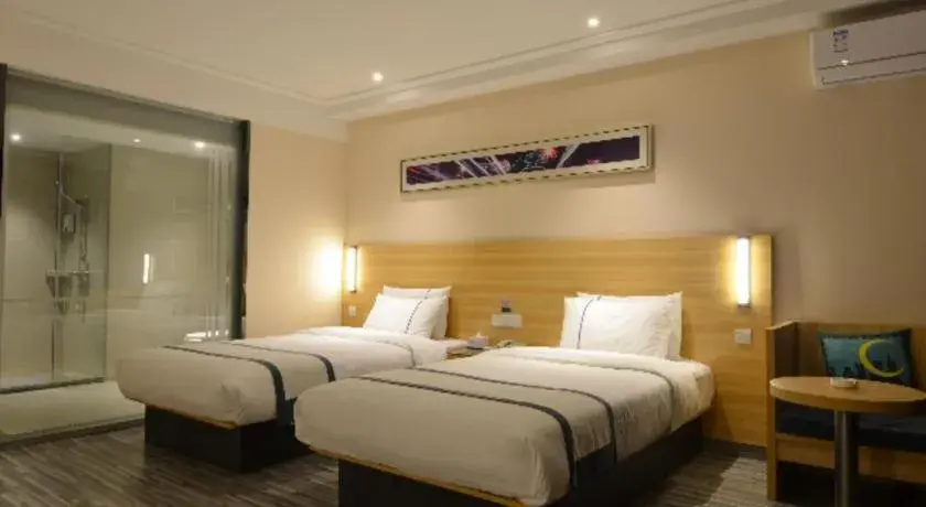 Bed in City Comfort Inn Huanggang Qichun Exhibition Center Bed in City Comfort Inn Huanggang Qichun Exhibition Center