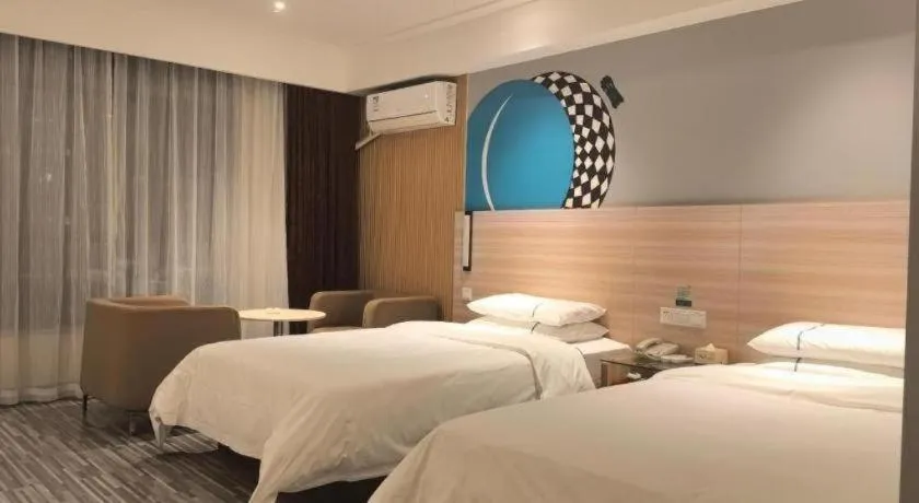 Bed in City Comfort Inn Huanggang Qichun Exhibition Center