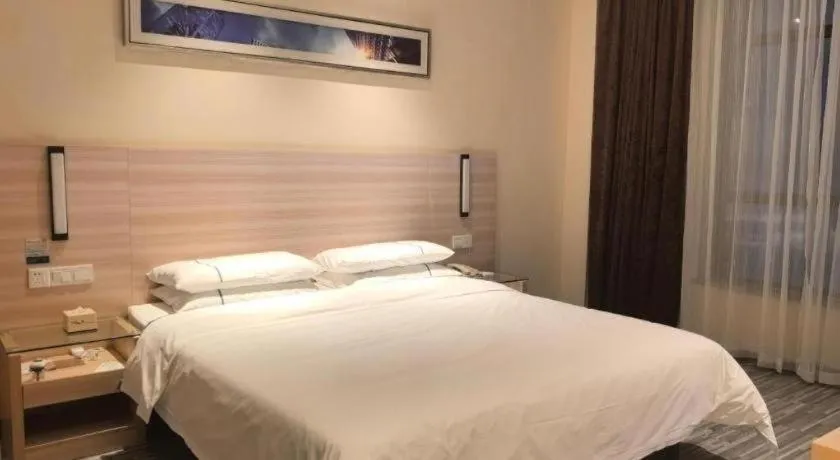 Bed in City Comfort Inn Huanggang Qichun Exhibition Center