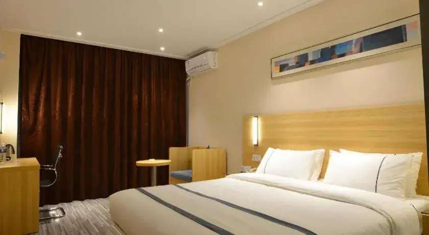 Bed in City Comfort Inn Huanggang Qichun Exhibition Center Bed in City Comfort Inn Huanggang Qichun Exhibition Center