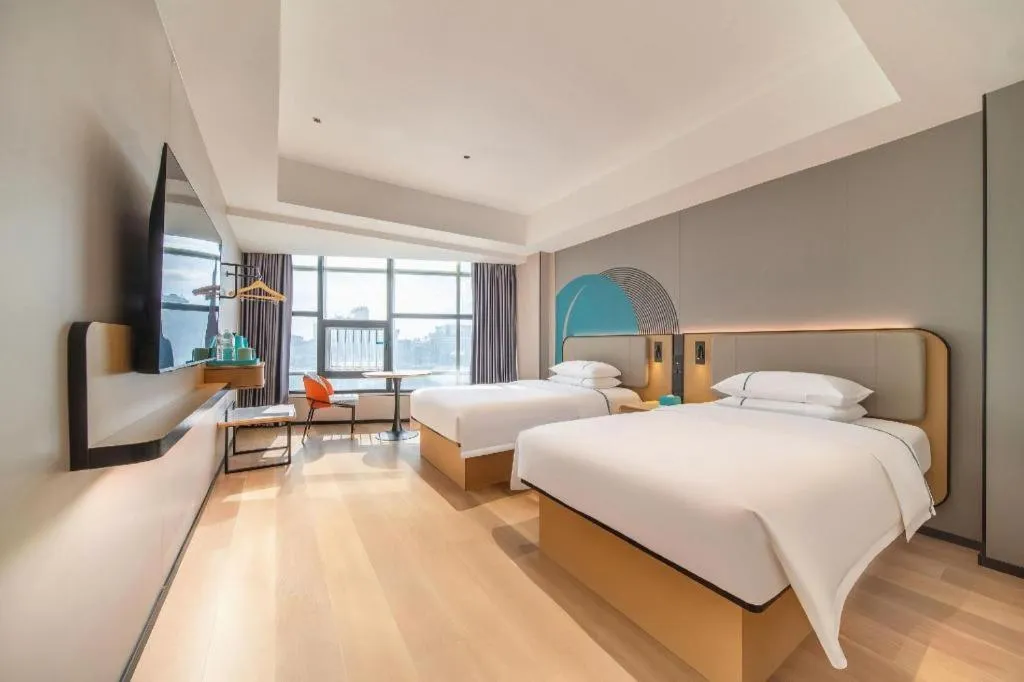 Bed in City Comfort Inn Zhanjiang Mazhang Pedestrian Street High-speed Railway West Station