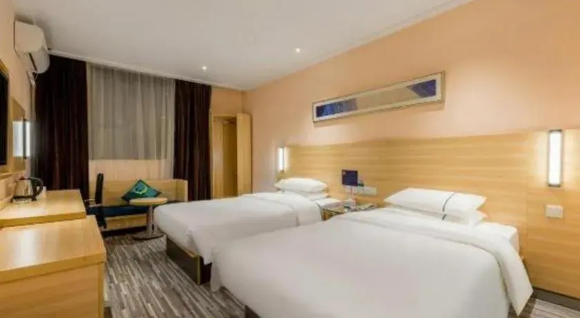 Bed in City Comfort Inn Foshan Kuiqi Road Metro Station Bed in City Comfort Inn Foshan Kuiqi Road Metro Station