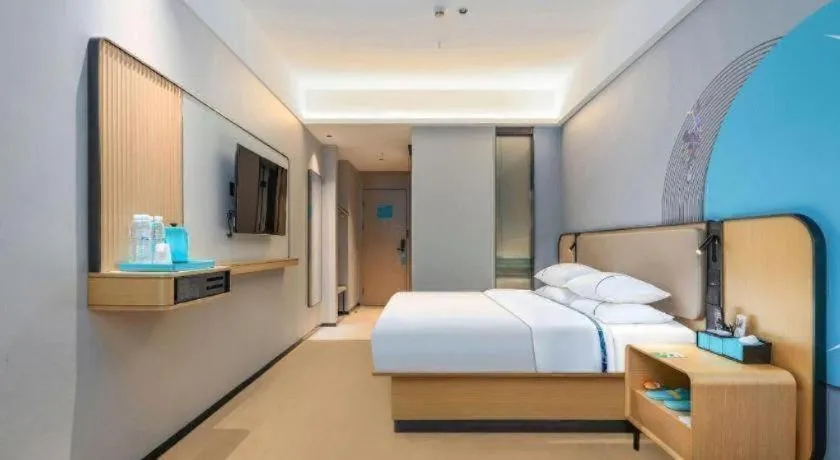Bed in City Comfort Inn Wuhan International Expo Center Qianjin Village Metro Station