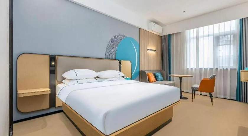 Bed in City Comfort Inn Wuhan International Expo Center Qianjin Village Metro Station