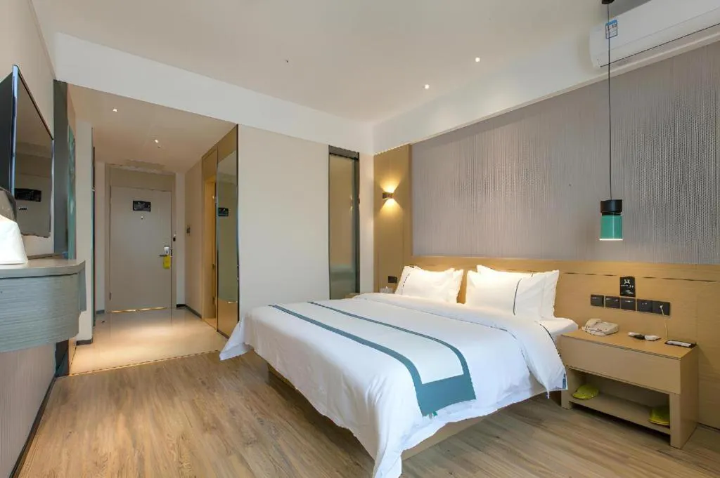 Bed in City Comfort Inn Wuhan International Expo Center Qianjin Village Metro Station