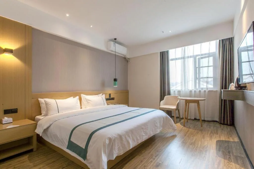 Bed in City Comfort Inn Wuhan International Expo Center Qianjin Village Metro Station