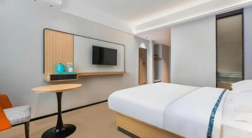 Bed in City Comfort Inn Wuhan International Expo Center Qianjin Village Metro Station