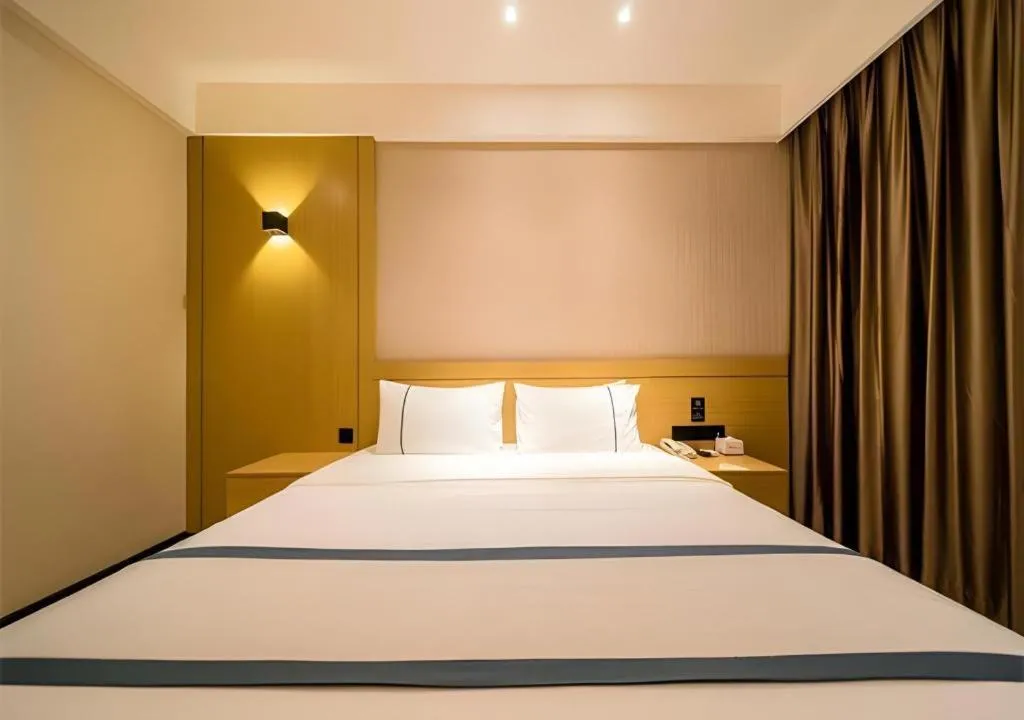 Bed in City Comfort Inn Wuhan International Expo Center Qianjin Village Metro Station