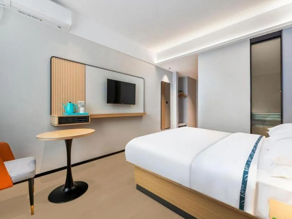 Bed in City Comfort Inn Wuhan International Expo Center Qianjin Village Metro Station