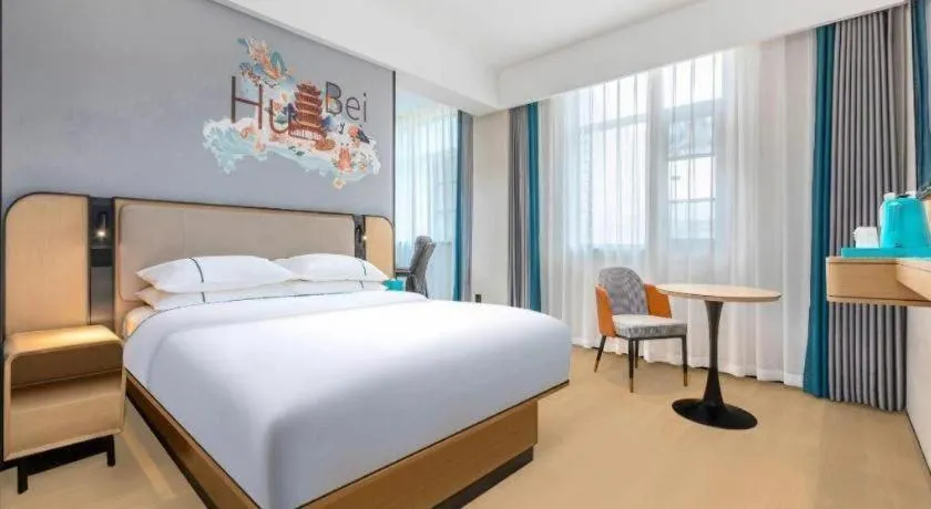 Bed in City Comfort Inn Wuhan International Expo Center Qianjin Village Metro Station