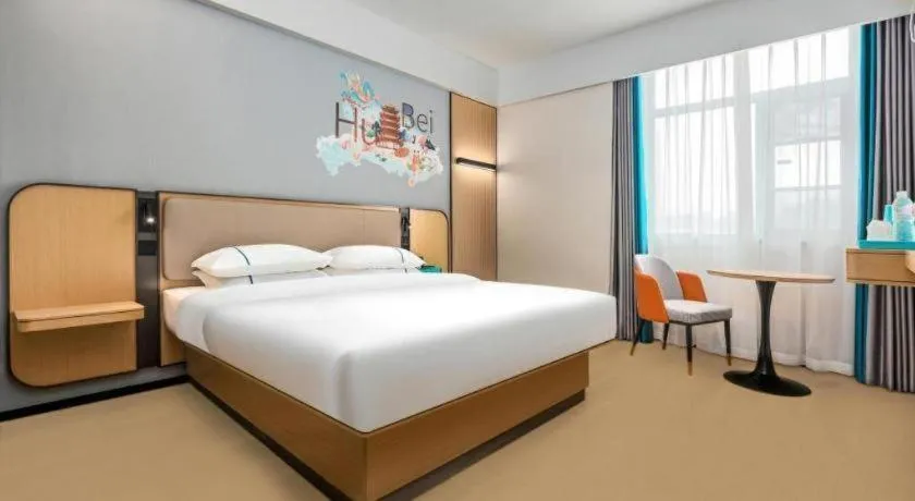 Bed in City Comfort Inn Wuhan International Expo Center Qianjin Village Metro Station