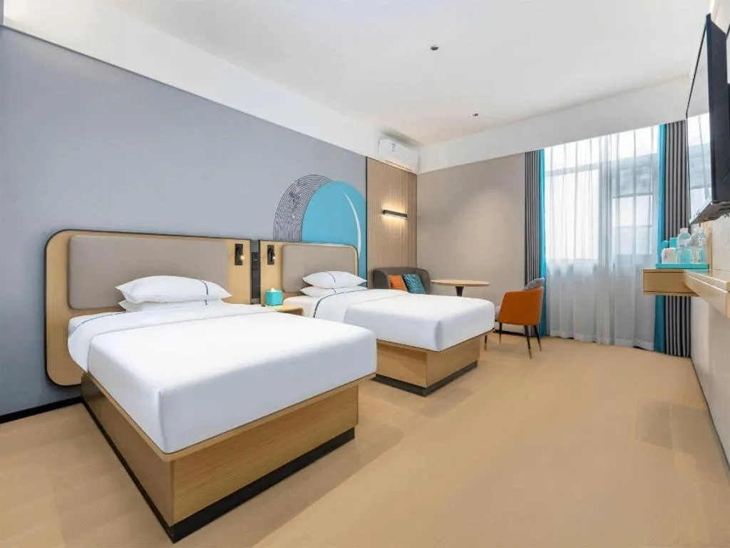 Bed in City Comfort Inn Wuhan International Expo Center Qianjin Village Metro Station