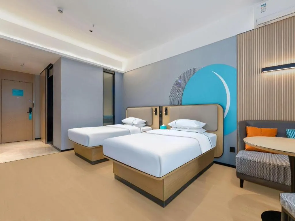 Bed in City Comfort Inn Wuhan International Expo Center Qianjin Village Metro Station