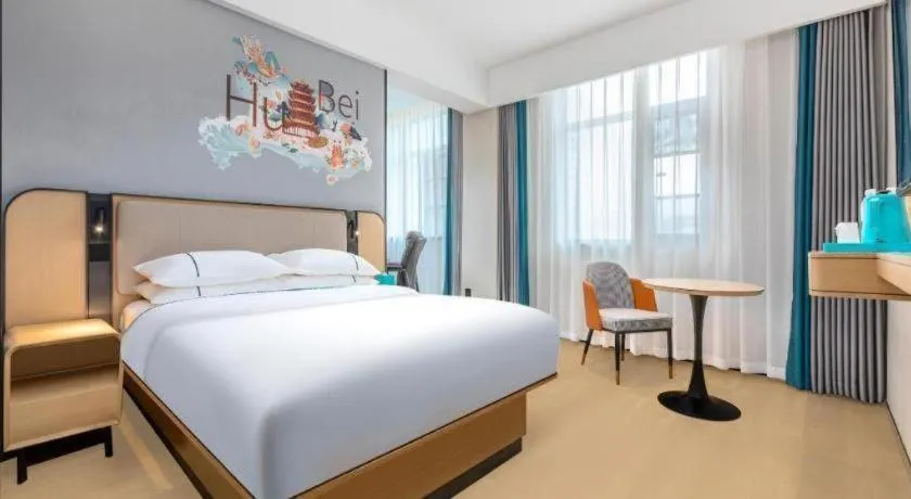 Bed in City Comfort Inn Wuhan International Expo Center Qianjin Village Metro Station