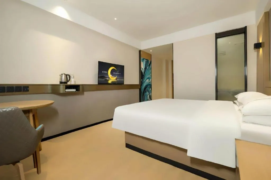 Bed in City Comfort Inn Wuzhou Municipal Government Vocational College