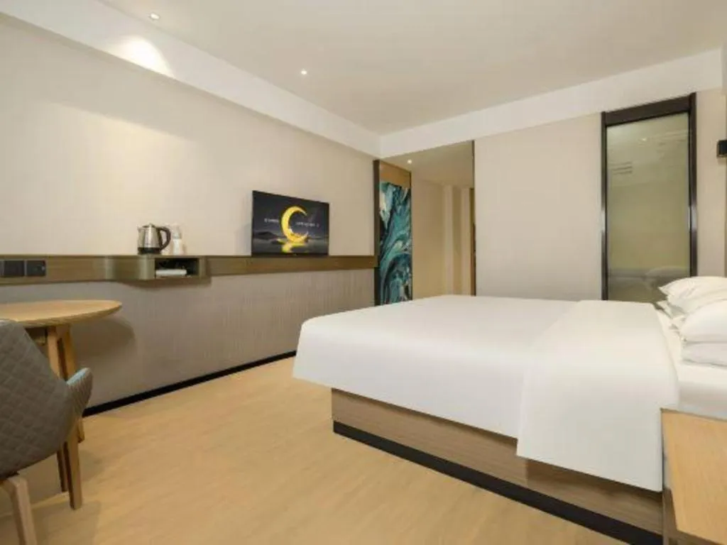 Bed in City Comfort Inn Wuzhou Municipal Government Vocational College