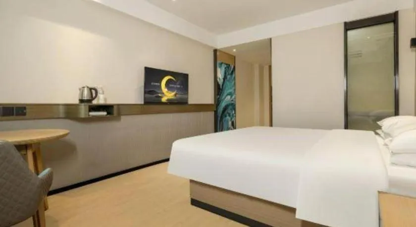 Bed in City Comfort Inn Wuzhou Municipal Government Vocational College