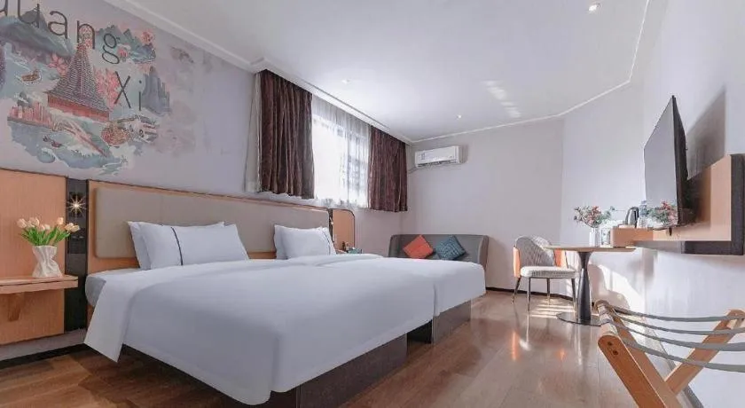 Bed in City Comfort Inn Liuzhou High-speed Railway Station