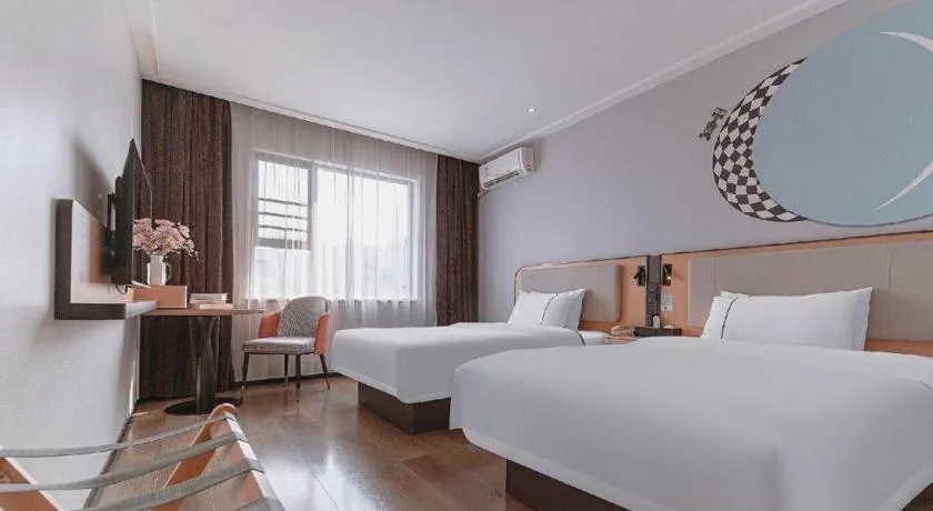 Bed in City Comfort Inn Liuzhou High-speed Railway Station