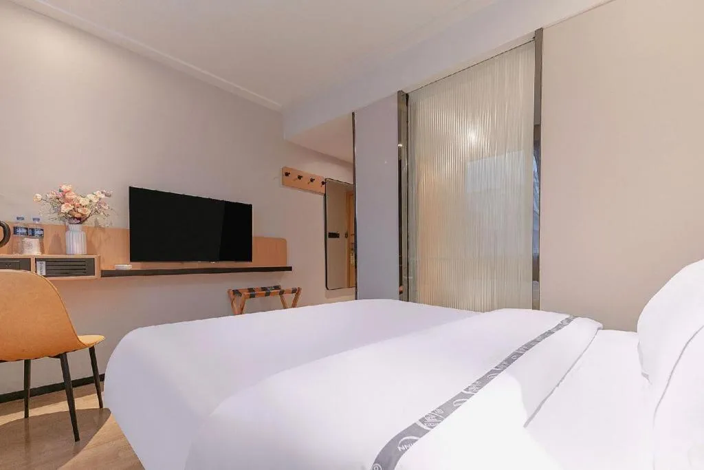 Bed in City Comfort Inn Liuzhou High-speed Railway Station