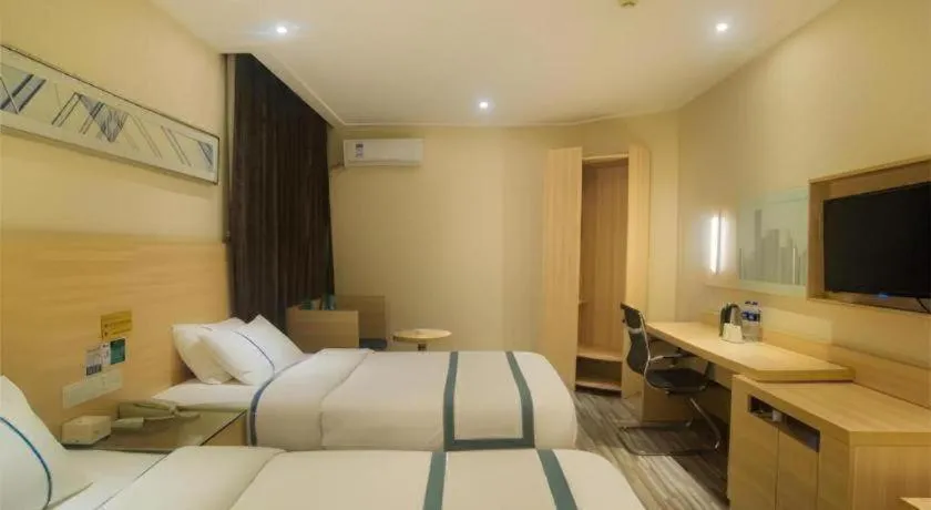 Bed in City Comfort Inn Liuzhou High-speed Railway Station