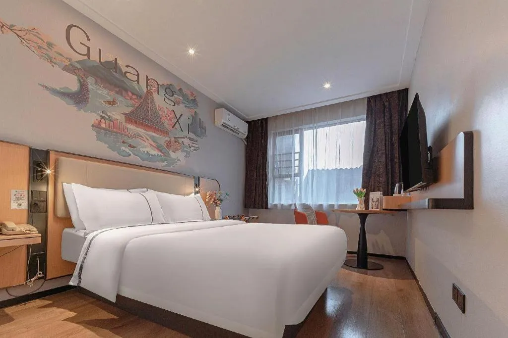 Bed in City Comfort Inn Liuzhou High-speed Railway Station