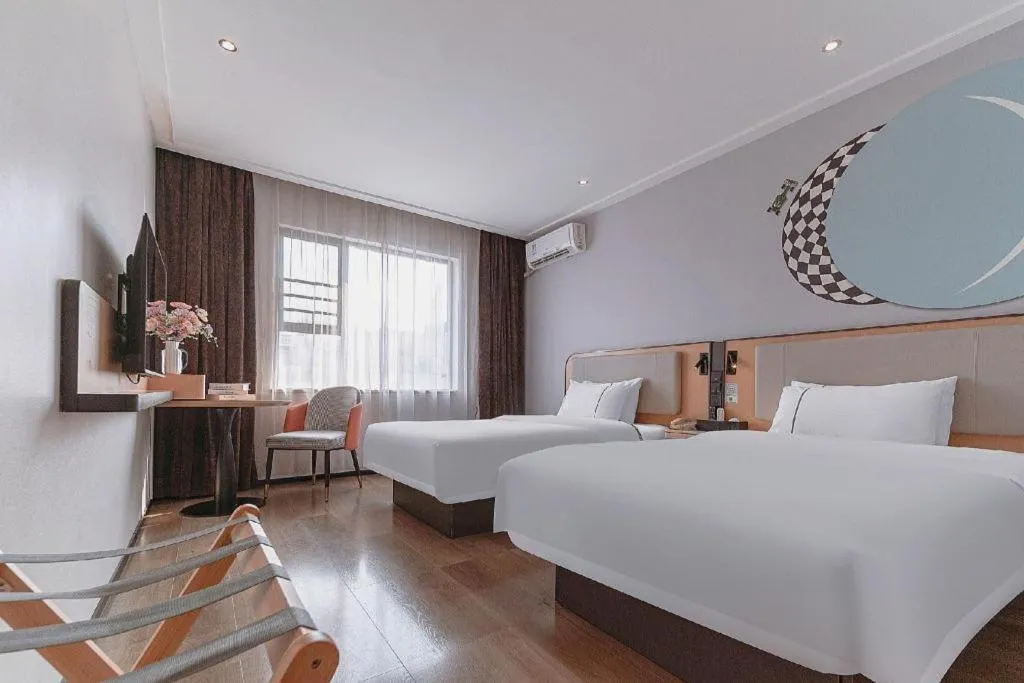 Bed in City Comfort Inn Liuzhou High-speed Railway Station