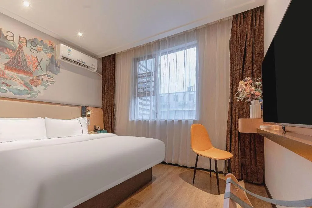 Bed in City Comfort Inn Liuzhou High-speed Railway Station