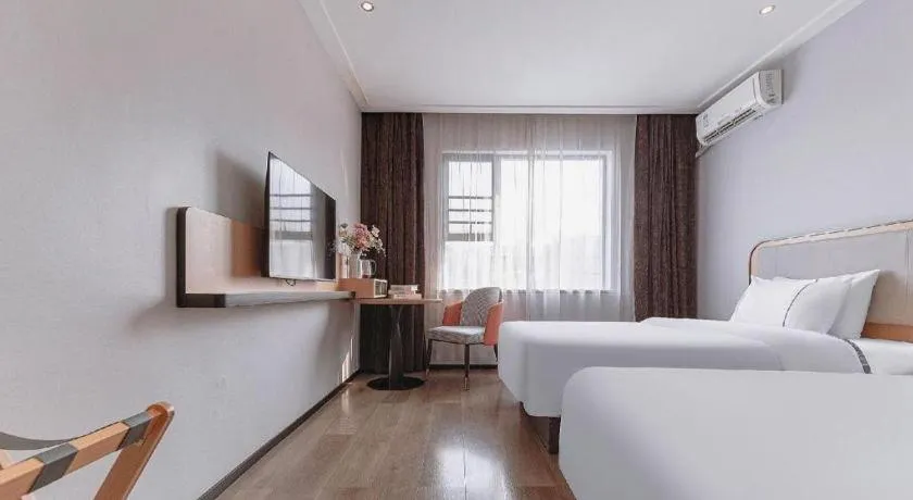 Bed in City Comfort Inn Liuzhou High-speed Railway Station