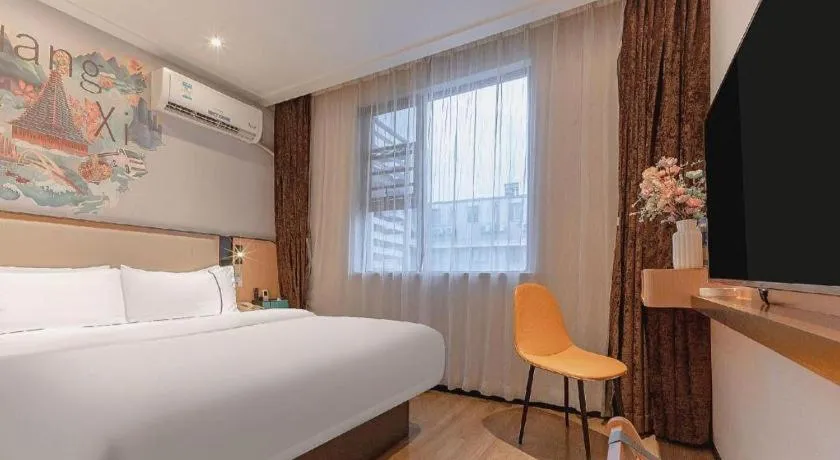 Bed in City Comfort Inn Liuzhou High-speed Railway Station