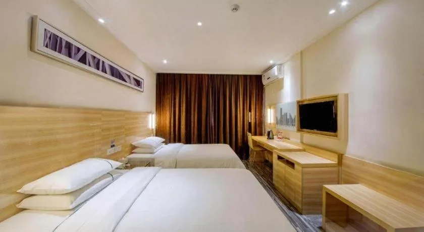 Bed in City Comfort Inn Guilin Two Rivers and Four Lakes Sun and Moon Shuangta