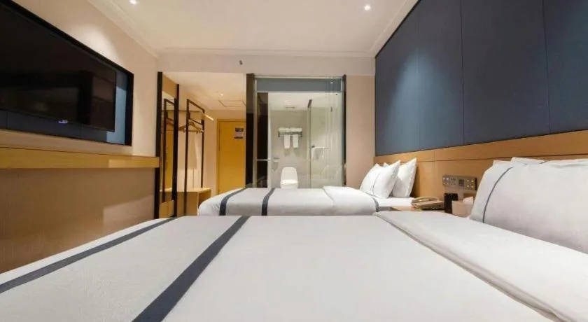 Bed in City Comfort Inn Guilin Two Rivers and Four Lakes Sun and Moon Shuangta