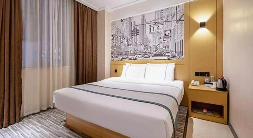 Bed in City Comfort Inn Liuzhou Wuxing Walking Street
