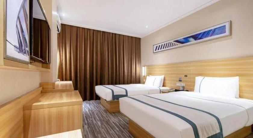 Bed in City Comfort Inn Liuzhou Wuxing Walking Street