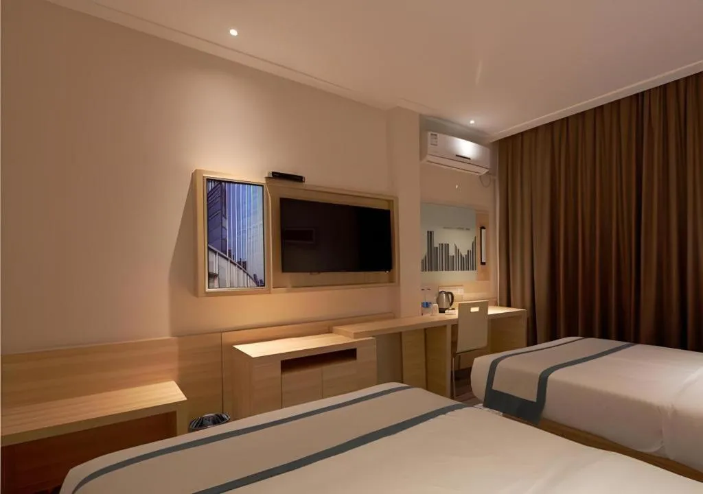 Bed in City Comfort Inn Liuzhou Wuxing Walking Street