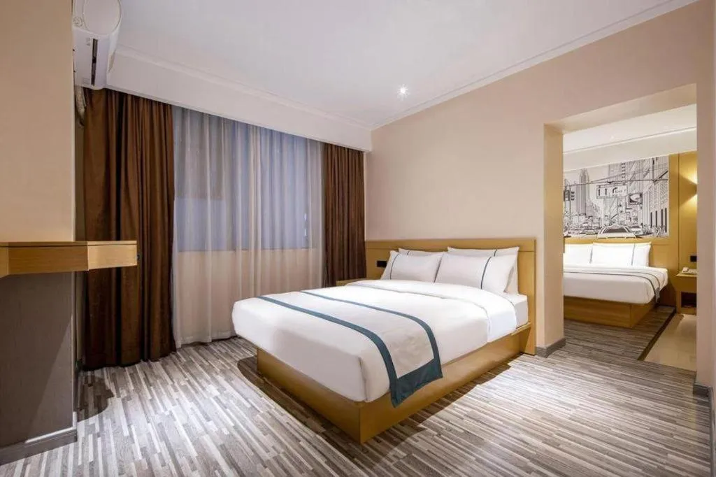 Bed in City Comfort Inn Liuzhou Wuxing Walking Street