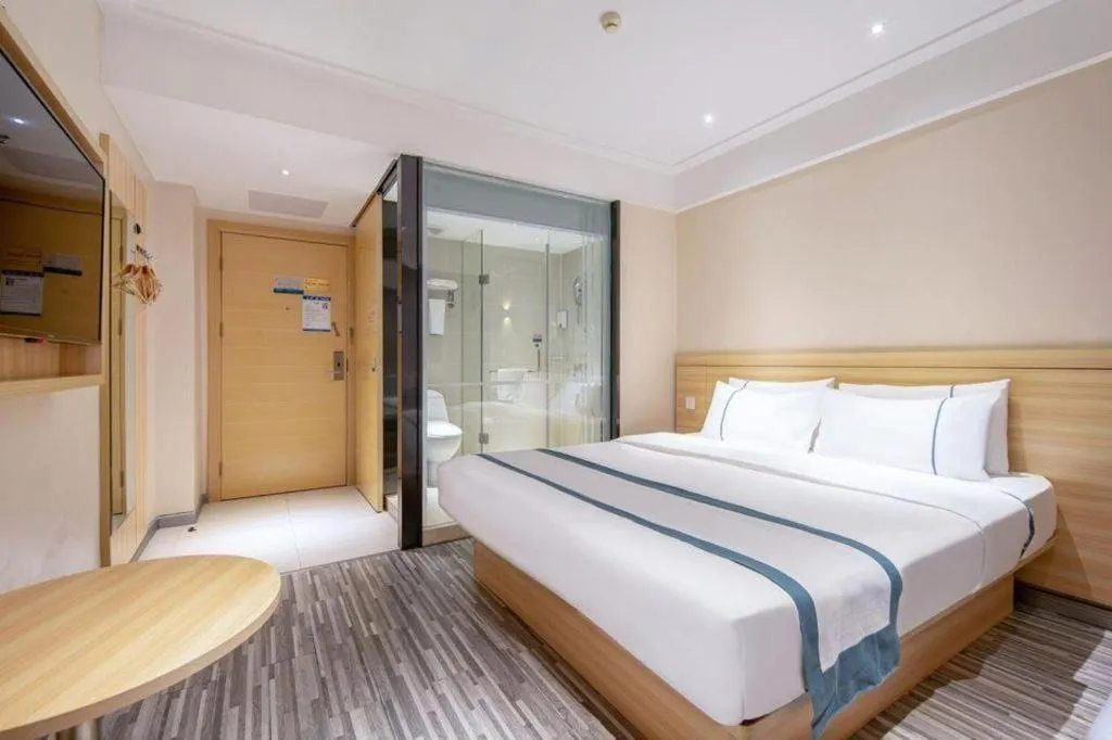 Bed in City Comfort Inn Liuzhou Wuxing Walking Street