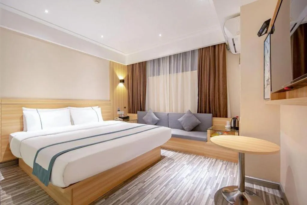 Bed in City Comfort Inn Liuzhou Wuxing Walking Street