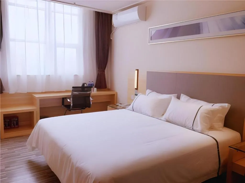 Bed in City Comfort Inn Zhuhai University Town Tangjiawan Plaza